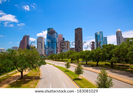 Houston Texas Skyline with modern skyscrapers and blue sky view from road