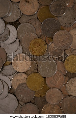 indian financial coins rupees with darkness and light for finance and banking