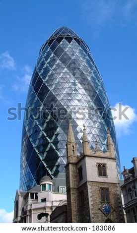 This is a image of the modern building called the Gherkin which is in London.