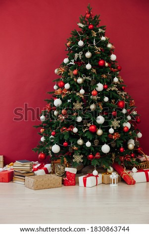 Christmas tree pine decor red background New Year holiday gifts