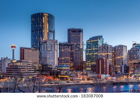 Calgary skyline at night with Bow River. Royalty-Free Stock Photo #183087008