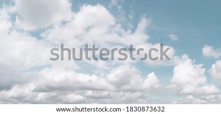 blue sky space horizontal with beautiful white puffy fluffy cumulus clouds with cloudy day in rainy season summer, abstract screen nature background 