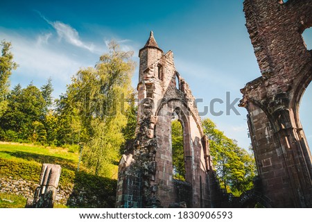 Picture of the monastery ruin Allerheiligen (engl. All Saints'Abbey) near Oppenau in the Black Forest, Germany with its tower and arches in the golden evening sunlight.