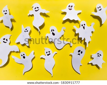Halloween Ghosts On Yellow Color Background, Halloween Concept Stock Photo 