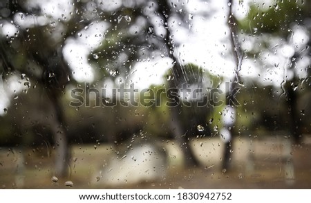 Raindrops on glass table, texture and nature, temporary