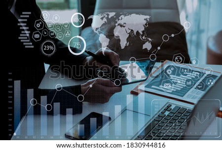 Double exposure of businesswoman hands using tablet computer with business financial stock market trading work from home, Technology digital and stock market concept, Background toned image blurred.