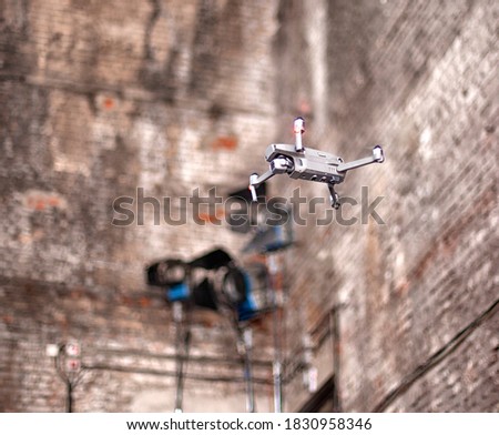 Quadcopter. Film industry. detail of Video camera. Broadcasting and Recording with Digital Camera, Quadcopter.