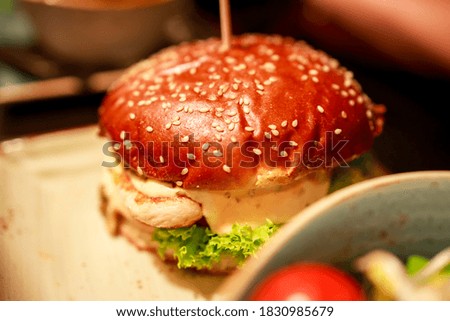 chicken burger with melted cheese
