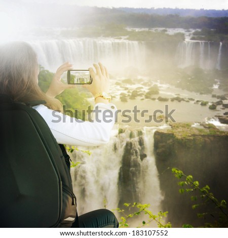 woman taking photo with mobile cell phone 