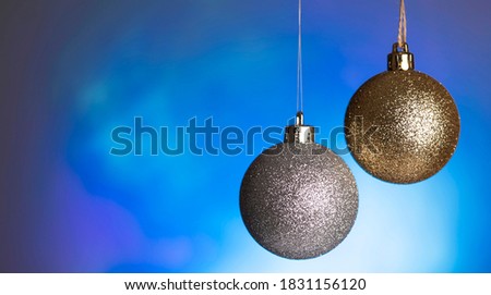 Christmas card with Christmas toys, Christmas balls and a blurry, abstract background