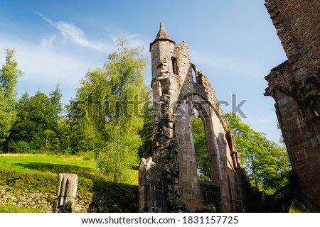 Picture of the monastery ruin Allerheiligen (engl. All Saints'Abbey) near Oppenau in the Black Forest, Germany with its tower and arches in the golden evening sunlight.