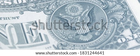 Coat of arms with the American dollar, with the inscription. Close-up.