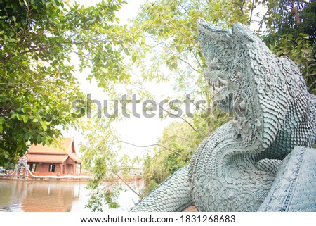 Naga or Serpent with tree and temple in background, "Wat Pa Klong 11" 