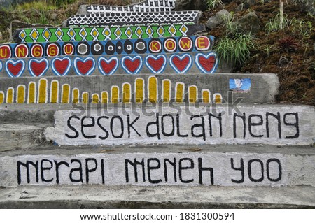 a text with java language in english "tomorrow I will go to Merapi again"