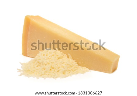 Whole and grated italian hard cheese Grana Padano or Parmesan isolated on white background. Delicious ingredient for pizza, sandwiches, salads. Front view. Royalty-Free Stock Photo #1831306627