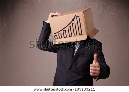 Businessman standing and gesturing with a cardboard box on his head with diagram
