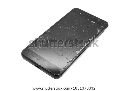 Broken display on a black smartphone isolate on a white background. Smartphone repair. Smartphone display replacement.