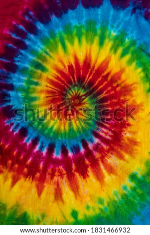 Fashionable Colorful Red, Blue, Yellow Green, Orange, Purple Retro Abstract Psychedelic Tie Dye Swirl Design Royalty-Free Stock Photo #1831466932