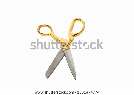 Scissors on a white background, scissors with gold handle
