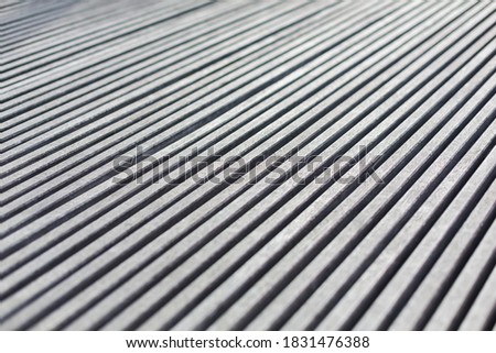 Texture of wood lath wall background. Seamless pattern of modern wall paneling with wooden slats for background. Selective focus