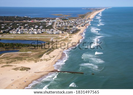 Aerial view along North Carolina Outer Banks showing Buxton to Avon Royalty-Free Stock Photo #1831497565