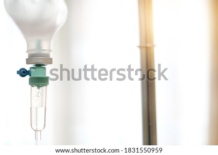 Saline bag in a hospital room. Concept for health and medicine.
