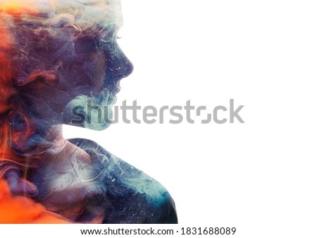 Art portrait. Female universe. Ice fire. Harmony balance. Double exposure glitter orange flames blue smoke in profile woman silhouette isolated on white copy space background. Royalty-Free Stock Photo #1831688089