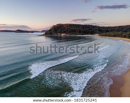 Sunrise over the sea at Umina Beach on the Central Coast, NSW, Australia. Royalty-Free Stock Photo #1831725241