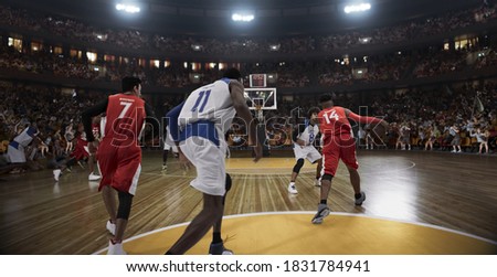 Basketball players on big professional arena during the game. Tense moment of the game. Stadium and crowd are made in 3d.