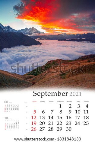 Calendar September 2021, vertical B3 size. Set of calendars with amazing landscapes. Unbelievable autumn sunrise at the foot of Mt. Tetnuld. Upper Svaneti, Mestia, Georgia, Europe.