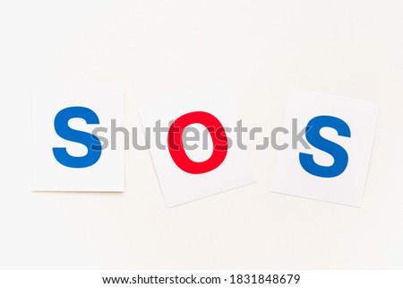 inscription sos on a white background