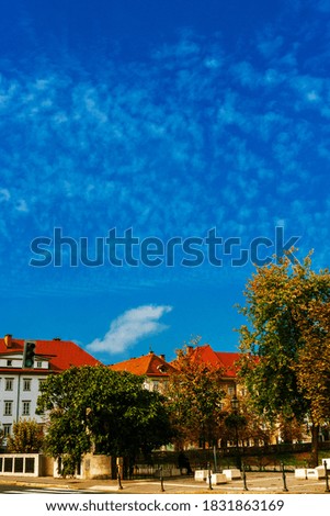 blue sky with clouds on the background of the old city