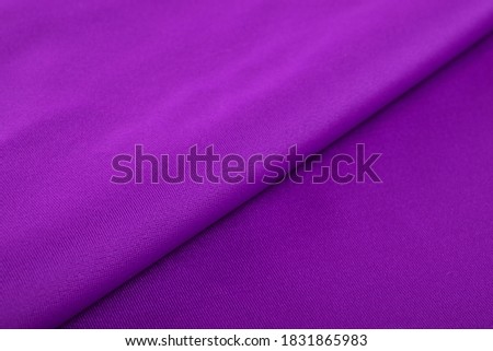 velvet, violet purple Knitted elastic fabric, weaving of threads texture, crumpled fold. For underwear, sports clothes and swimwear. Space for text. Royalty-Free Stock Photo #1831865983