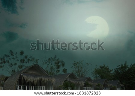 Spooky resort with moonlight and night scene background