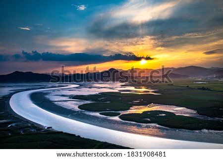 Aerial and sunset view of the sea with mud flat at Suncheonman Bay of Waon Beach near Suncheon-si, South Korea
 Royalty-Free Stock Photo #1831908481