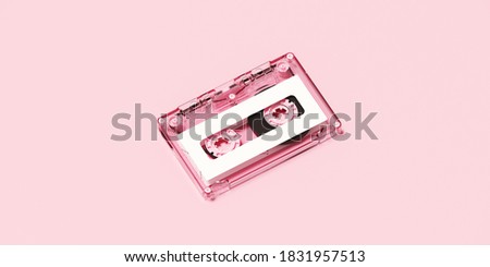 Minimal happiness object for love, wedding and valentine concept. Clear pink cassette tape with white label on pink background. 3d rendering illustration. Clipping path of each element included.