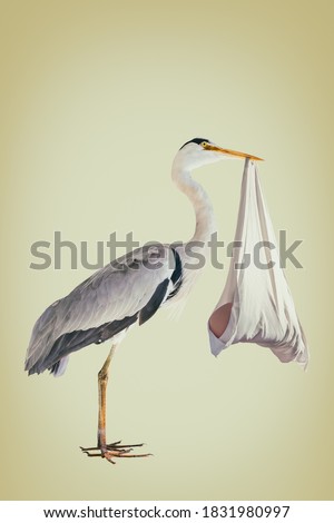 Retro styled image of a stork holding a newborn baby in a white blanket Royalty-Free Stock Photo #1831980997