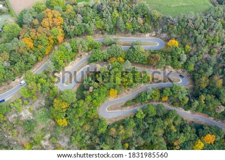 The serpentine driveway to Patersberg / Germany in Rhineland-Palatinate to the view of three castles Royalty-Free Stock Photo #1831985560