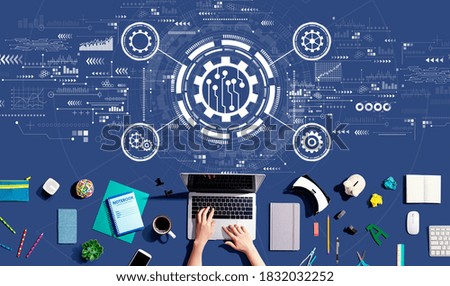 Automation concept with person using a laptop computer