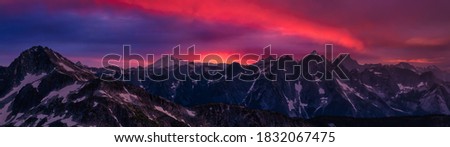 Panoramic Canadian Mountain Landscape. Dramatic Sunset Artistic Composite. Picture taken from top of Webb Peak near Chilliwack, East of Greater Vancouver, British Columbia, Canada.