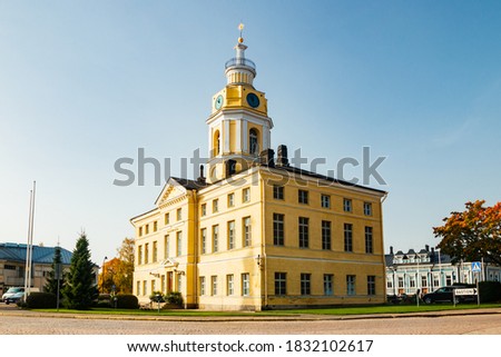 Old Town hall of Hamina at sunny autumn day, Finland. The finnish world "Raatihuone" on the wall means "Town Hall". Royalty-Free Stock Photo #1832102617