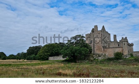 Summer photo of the famous Craigmillar Castle and gardens, home of Mary Queen of Scots in Edinburgh Scotland UK