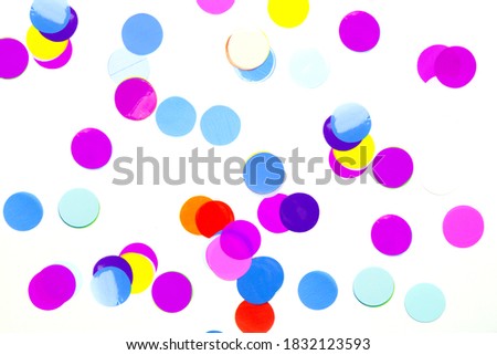 Festive, multicolored paper confetti in the form of circles isolated on white background