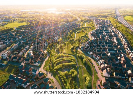 Aerial view of uk home newly built estate development masterplan landscape in England, Royalty-Free Stock Photo #1832184904