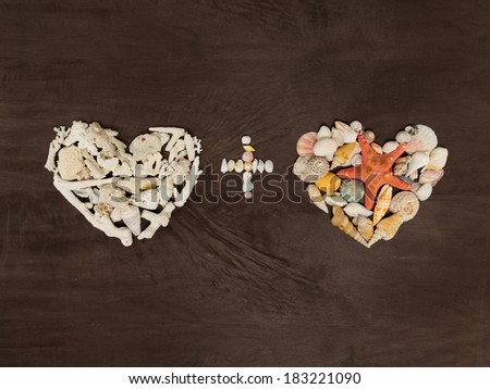 two hearts made Ã?Â¢??Ã?Â¢??of shells and starfish and the plus sign