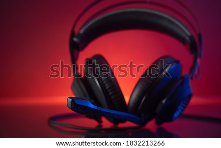 Gamer Headphones Dark Background and colorful Light.