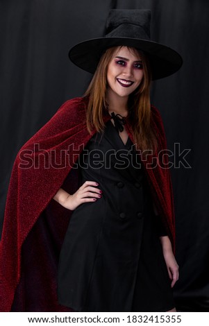 Portrait of asian young adult teenage woman wear Halloween costume cloth for Halloween party carnival. Halloween celebrate and international holiday concept.