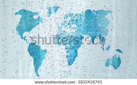 World map on window with water drops,