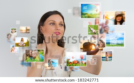 Portrait of young happy woman sharing her photo and video files in social media 