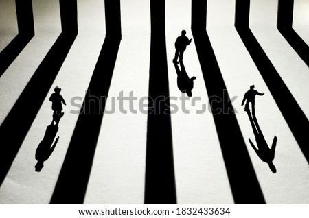Three people chasing the light